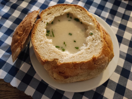 Garlic soup in bread bowl