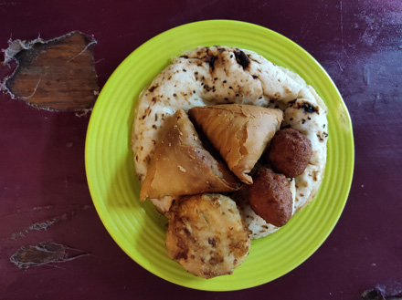 Local snacks including samosas and chapati