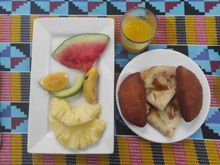 Breakfast: Fresh fruit, juice, pancakes and donuts