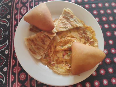 Breakfast: Omelette, chapati and mandazi donuts