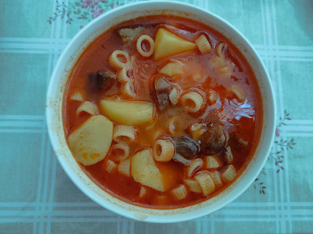 Noodle soup with potatoes and lamb